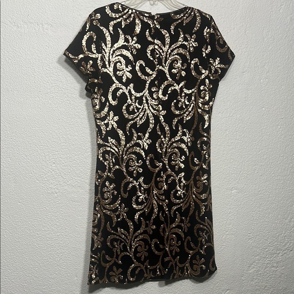 Jessica Simpson - Elegant Black and Gold sequence Dress size 10
Worn once - Picture 6 of 7